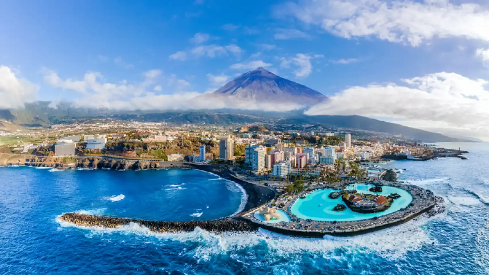 Digital nomads working near the coast in Tenerife.