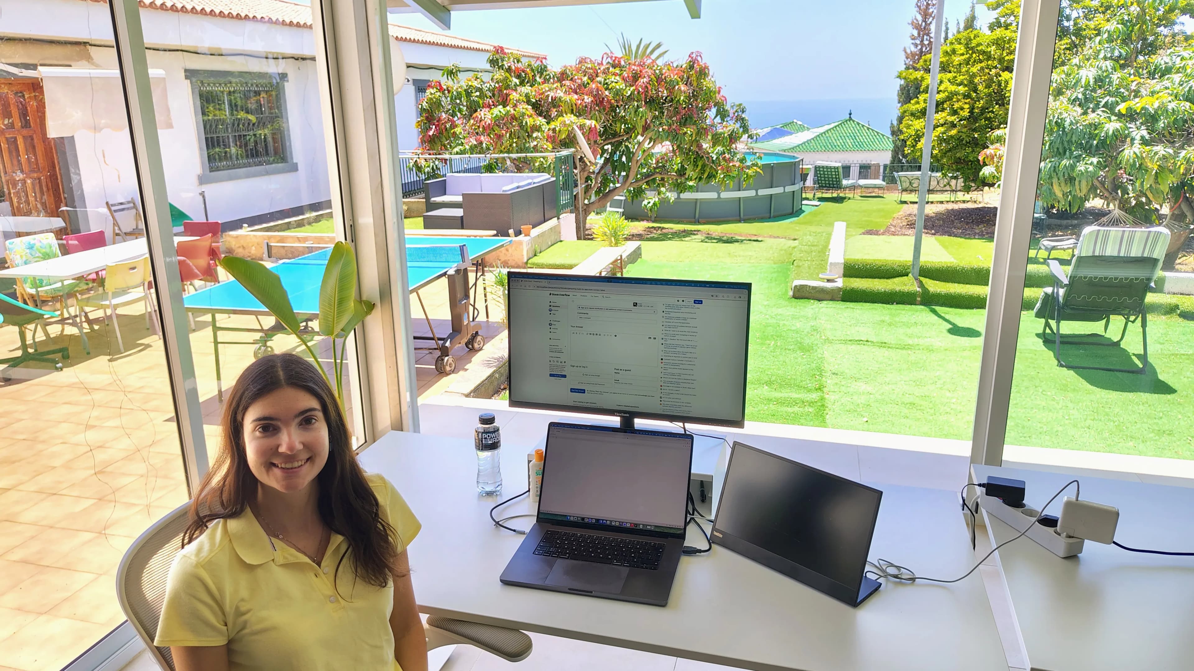 Desk view toward the garden and Atlantic from the coworking room.