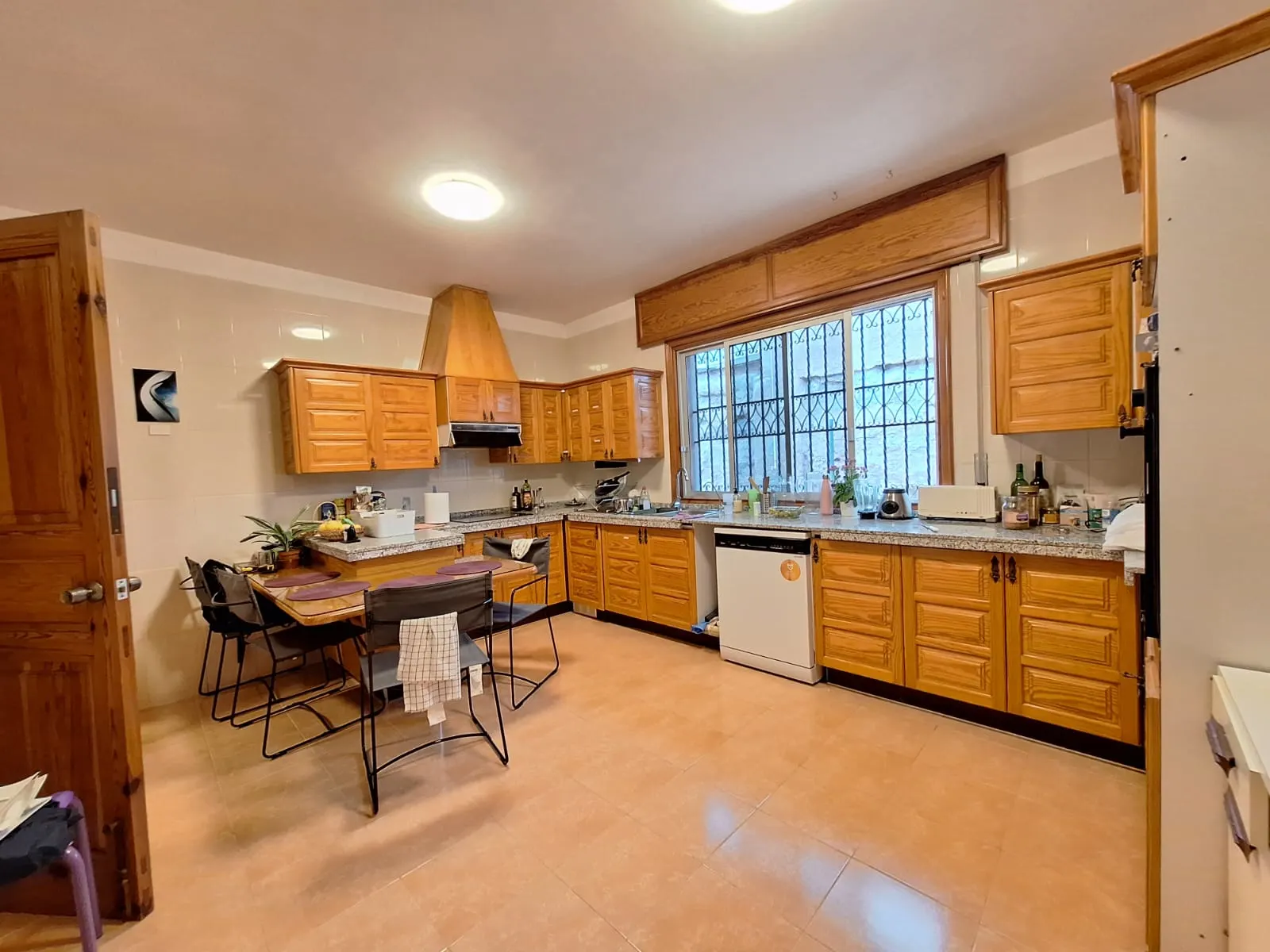 Shared kitchen at Blue Paradise ready for community meals.