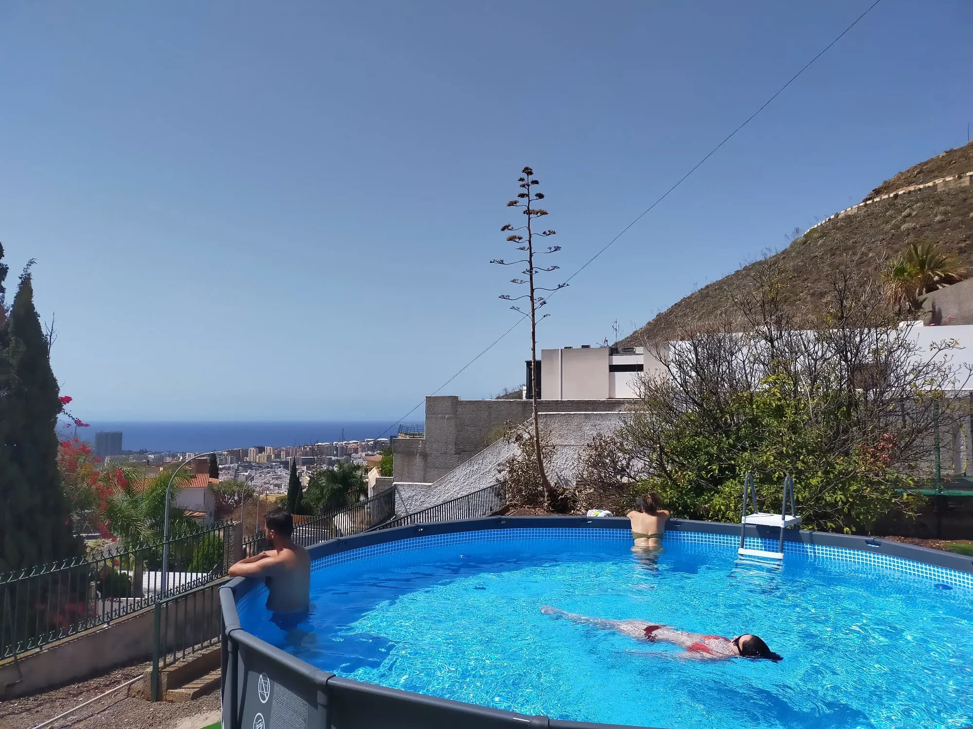 Swimming pool with ocean and Santa Cruz views.