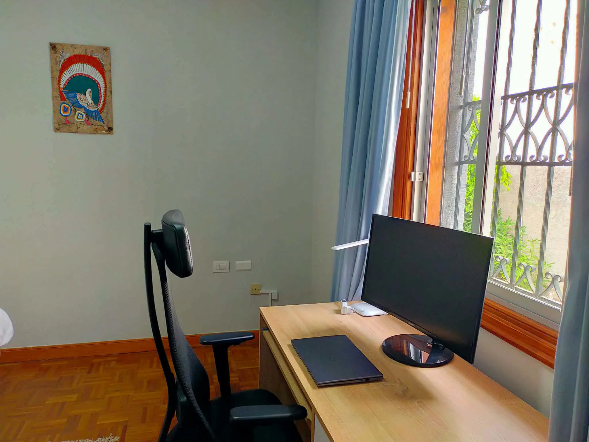 In-room desk setup for full work days at Blue Paradise.